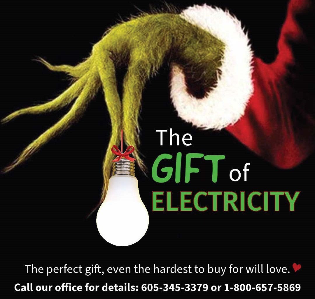 Grinch hand holding lightbulb